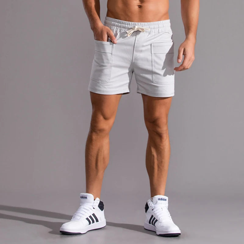 2023 Novo Verão 100% Algodão Shorts Sólidos Homens de Alta Qualidade Casual Sports GYM Cintura Elástica Homens Shorts 8 Cores Praia Shorts